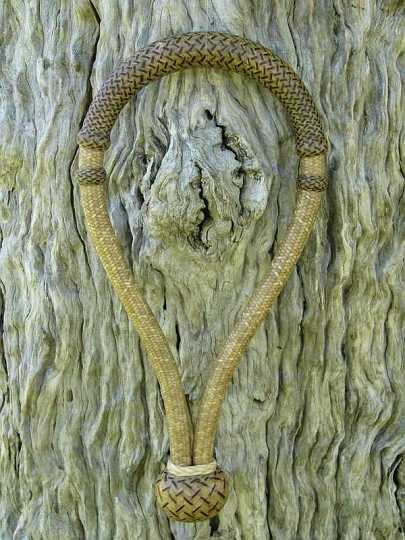 P1100568.jpg - Trappings Of Texas '05 ~ Best of Show ~ Braiding & Hitching class
32 Plait Rawhide Bosal with Saddle Tan interweaves. 10 string Nose, rawhide braided core. This is some of Chris's finest work. The strings in the nose were 1mm x .25mm deep. The piece was covered by a story in the Feb/March '06 issue of 
RM Williams " Outback" magazine  . simply stunning !