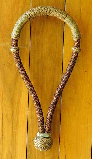 P1130297-1.jpg - 16 Plait 5/8" Rawhide Bosal. Cheeks have been dyed - which gives the 2 toned piece an edge of difference. The dyed strings have a very fine natural edge & with the interweaves in the nose + heels to match the cheeks, it looked a treat. This piece sold to a private collector.