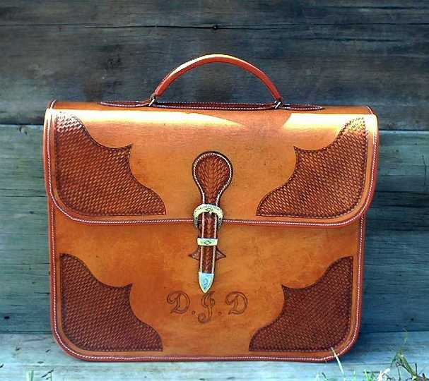 Apr17_04-1.jpg - Custom made leather breif case with basket stamped corners & carved initials .