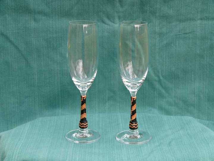 Flutes-1.jpg - Crystal flutes with braided stems.
Very Unique gifts.