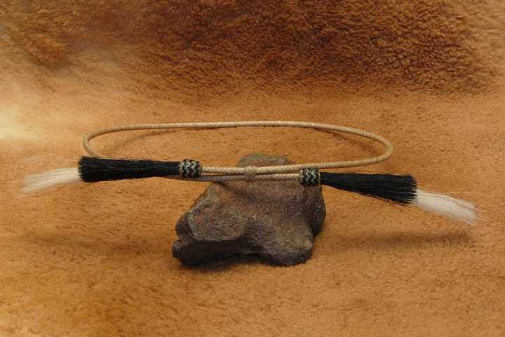 Hatband.JPG - Custom made hat band .Rawhide kangaroo with horse hair tassels.