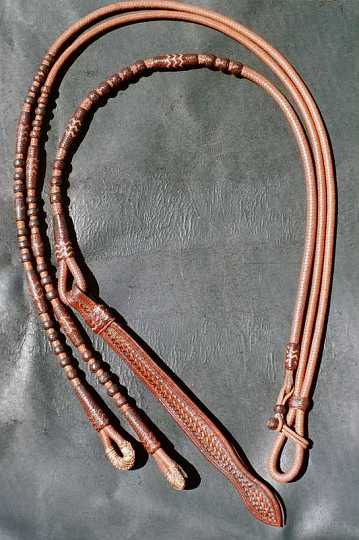 12.jpg - 16 plait Kangaroo hide Romal reins .Natural roo hide with whiskey knots and buttons .