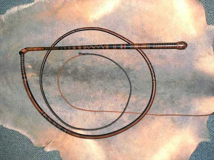 Dec30-02-1.jpg - This is a 24 x24 plait 6ft stock whip that was entered in the " Dame Mary Outback Craft Awards" and recieved a Highly commended award in 2002.