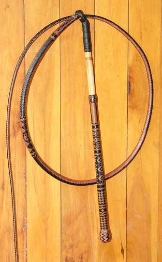 P1150162.JPG - Trophy stockwhip 32 plait half handle 16 plait thong . Two toned natural and dark brown kangaroo hide . Patterned handle and thong.